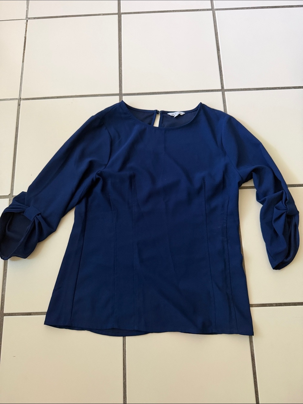 Naked Zebra Navy Twist-Cuff Blouse